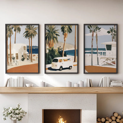 A 3-piece coastal cliff art set in sleek black frames lends the sitting room mantel display a breezy California warmth.