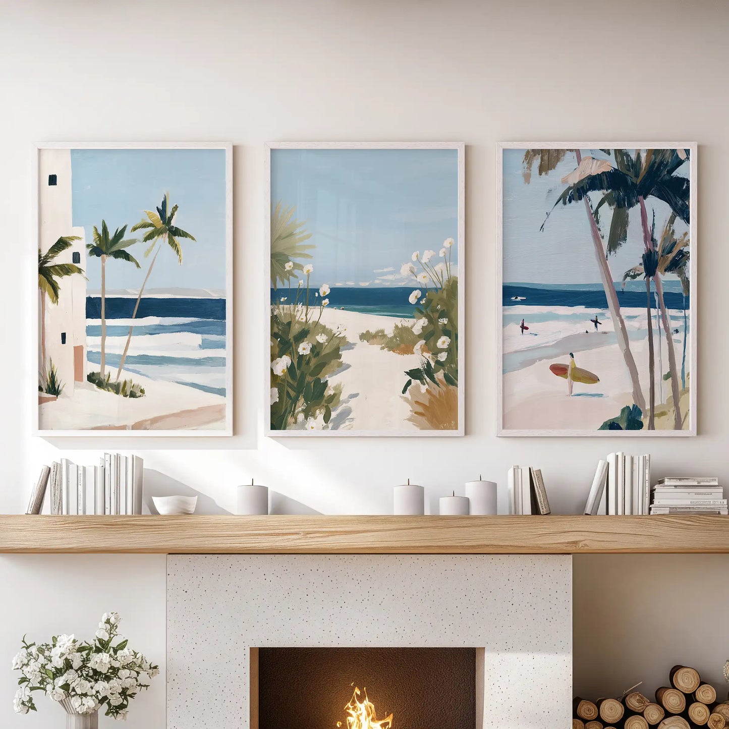 Lounge wall art of three white-framed shoreline prints layers pale horizon color above the mantelpiece for a serene central accent.