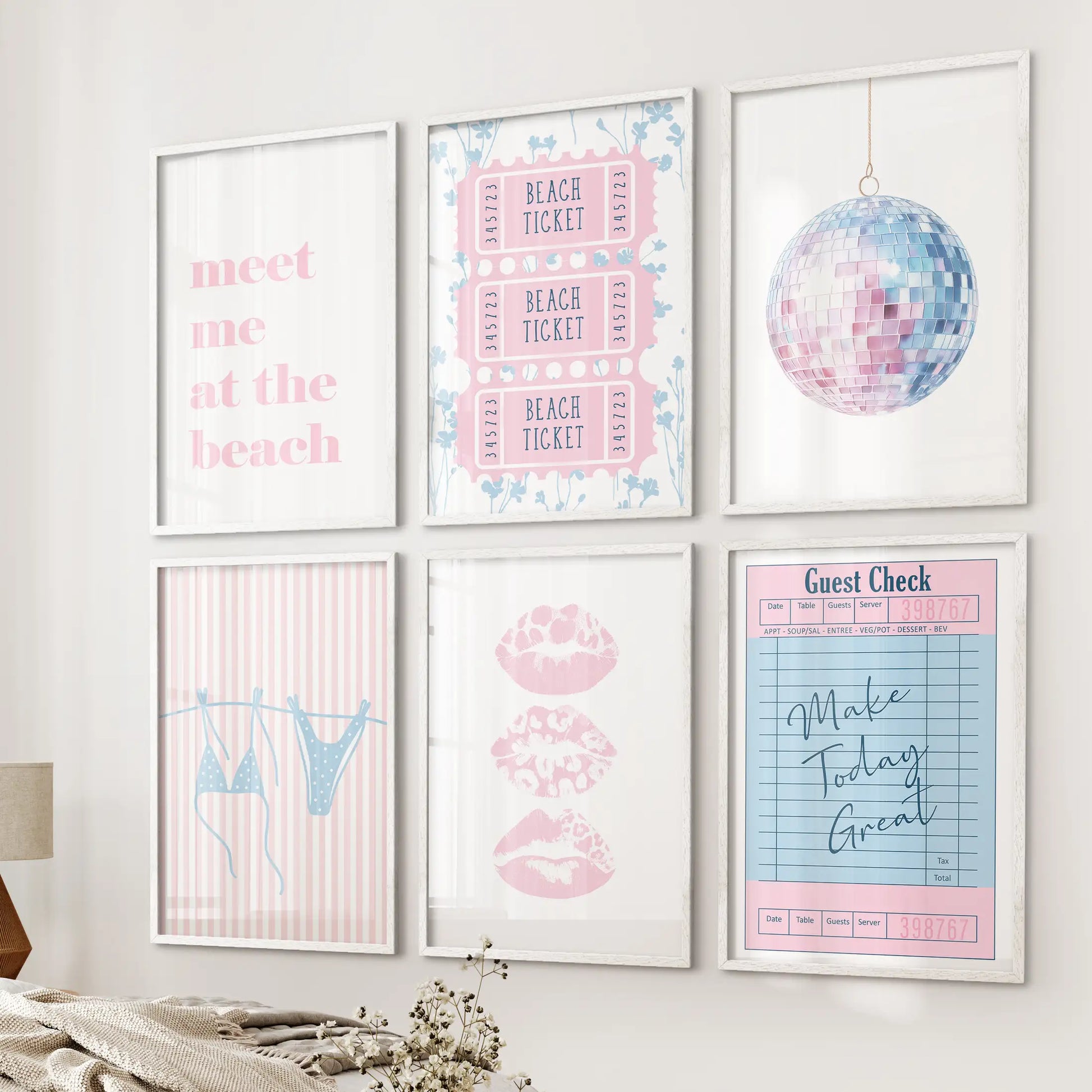 A six-piece wall art set in white frames reads “Meet Me at the Beach,” resting near the bed for an easy coastal look accented by lips and disco shimmer.