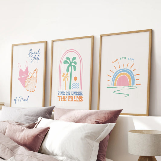 Tropical bikini illustration wall art, three-print set in warm wood frames, completes the pink bedroom and hangs above the bed.