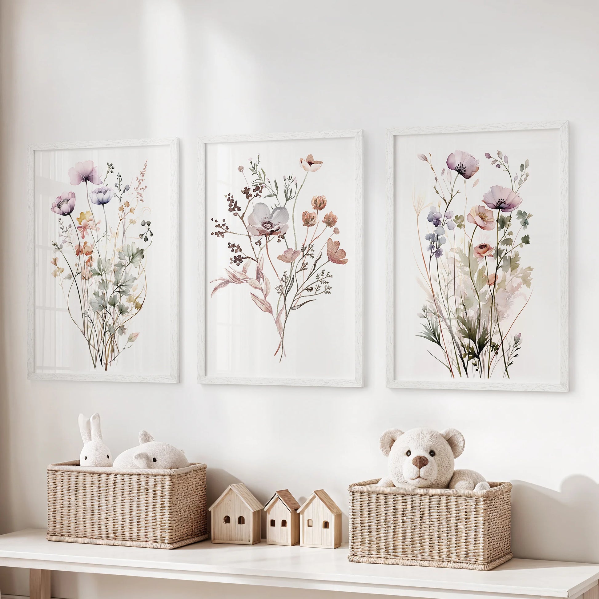 Wildflower meadow wall art trio, white framed and styled above a storage bench to add playful color in the kids playroom.