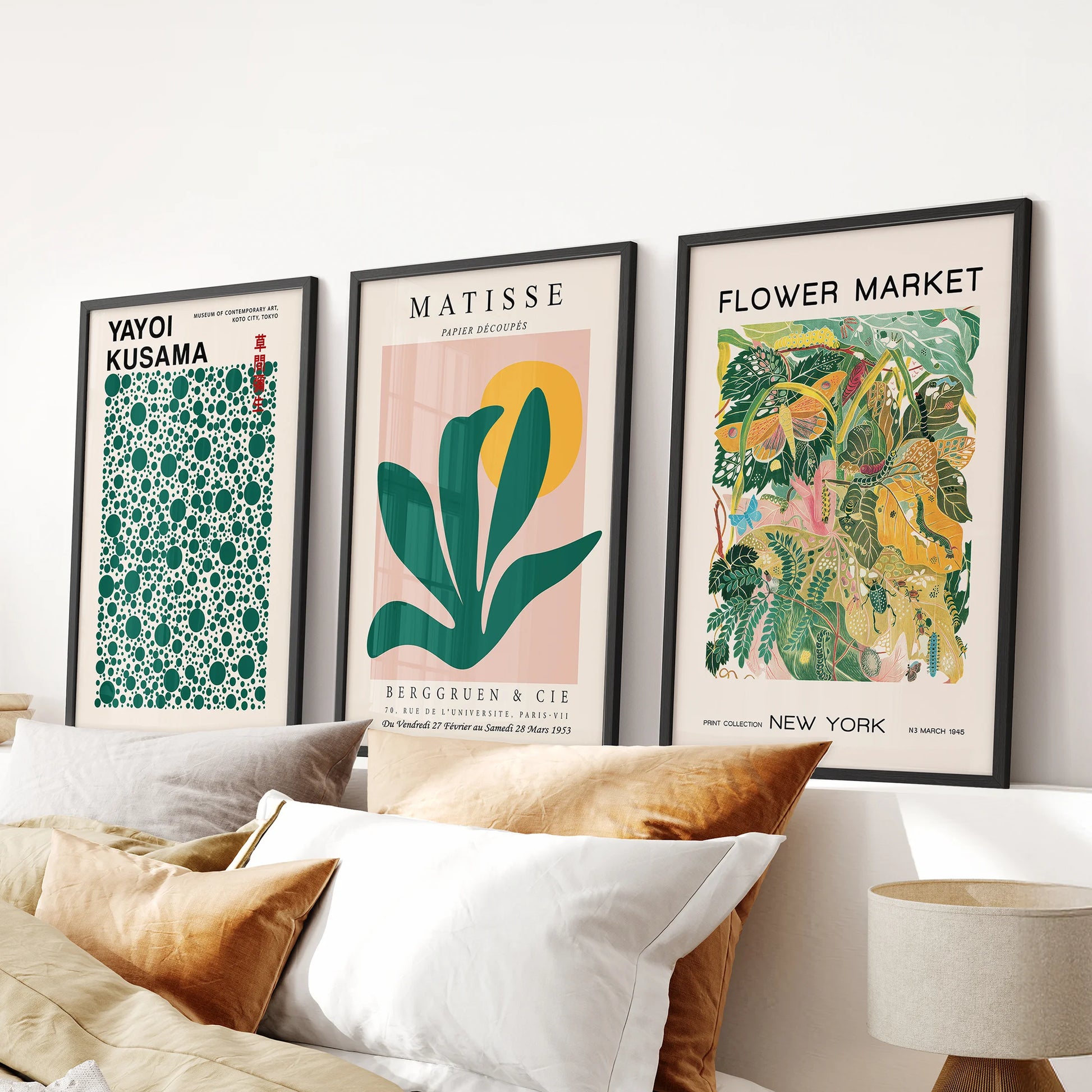 Matisse-inspired cutout prints in a wall art trio, set in slim black frames for the bedroom and hung over the headboard for a crisp, modern focal point.