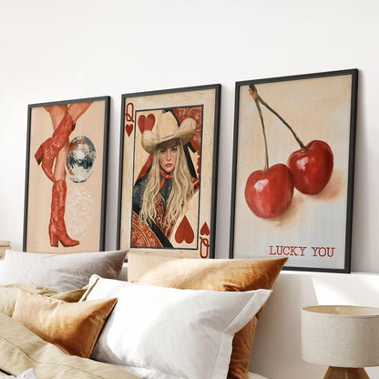 Lucky You playing card 3-print wall art set, black-framed, centered over the headboard to add vintage whimsy to a bedroom.