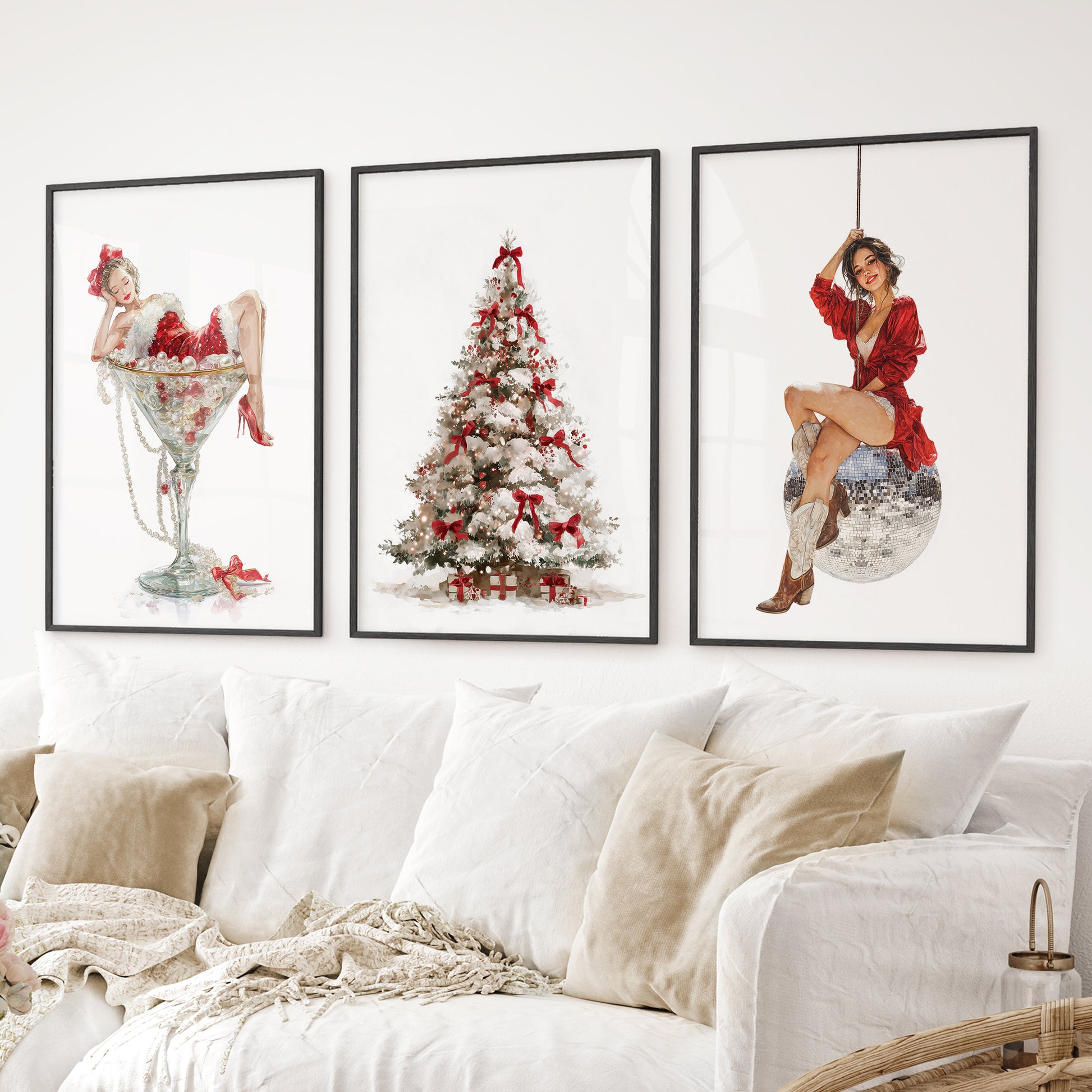 Festive holiday poster set – pin up inspired wall decor with Christmas theme. Black frames above the sofa.