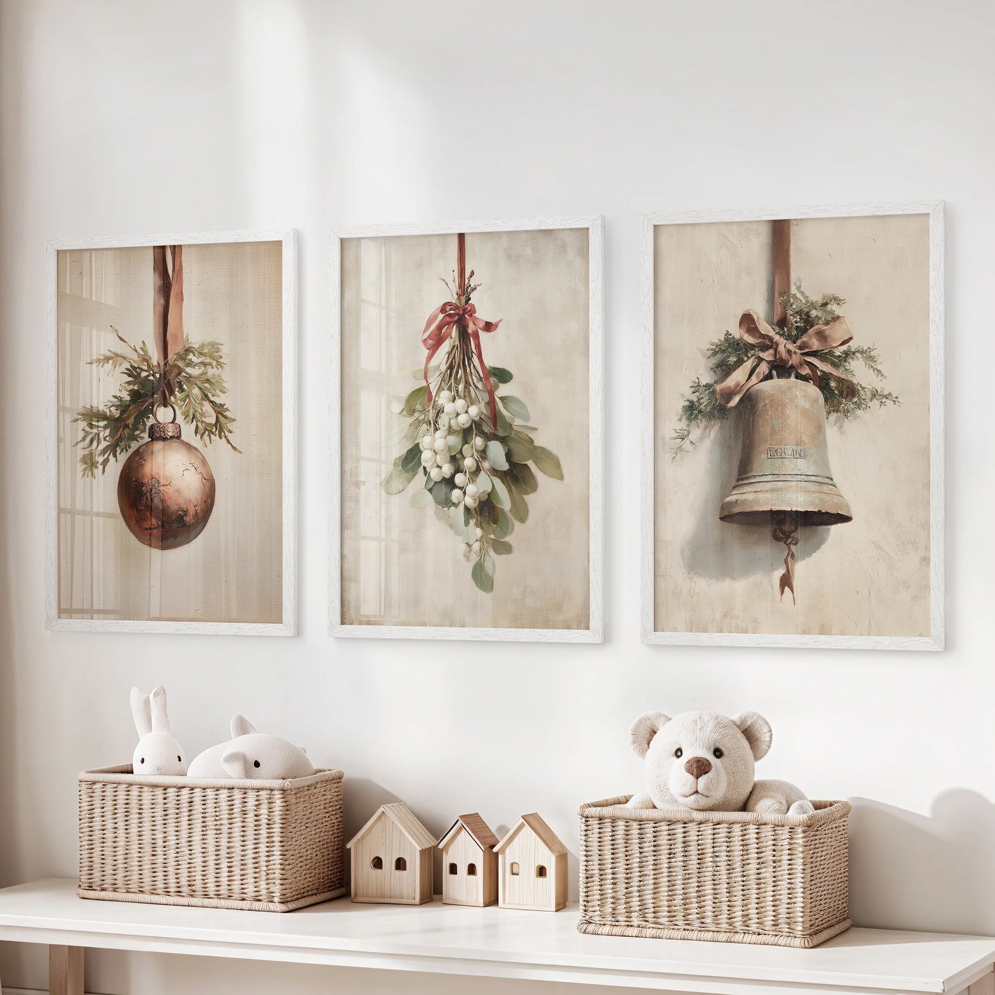 Vintage Christmas illustrations, a three-print set, brighten the playroom over toy storage in white framed prints with light, cheerful nostalgia.