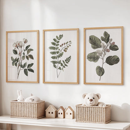 Set of 3 floral wall decor prints in natural wood frames sits above toy storage, adding warm rustic charm to the children's room.
