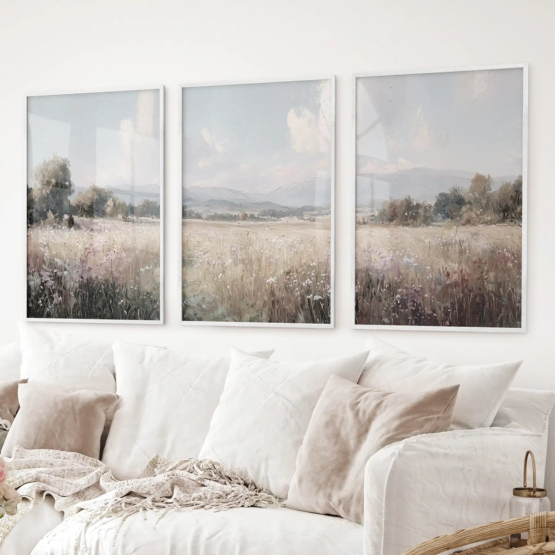 Neutral country set of 3 vintage wall art. Fields landscape painting. White frames over the couch..