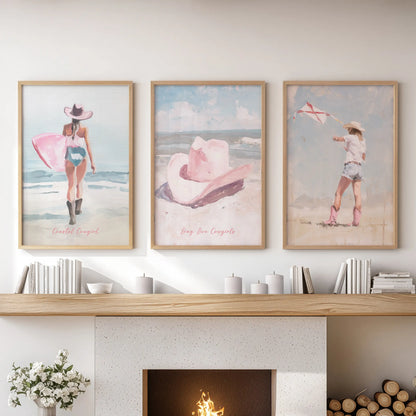 Pink surfer girl three-piece wall art set in solid oak frames perches above the sitting room mantle, softening the space with coastal blush.
