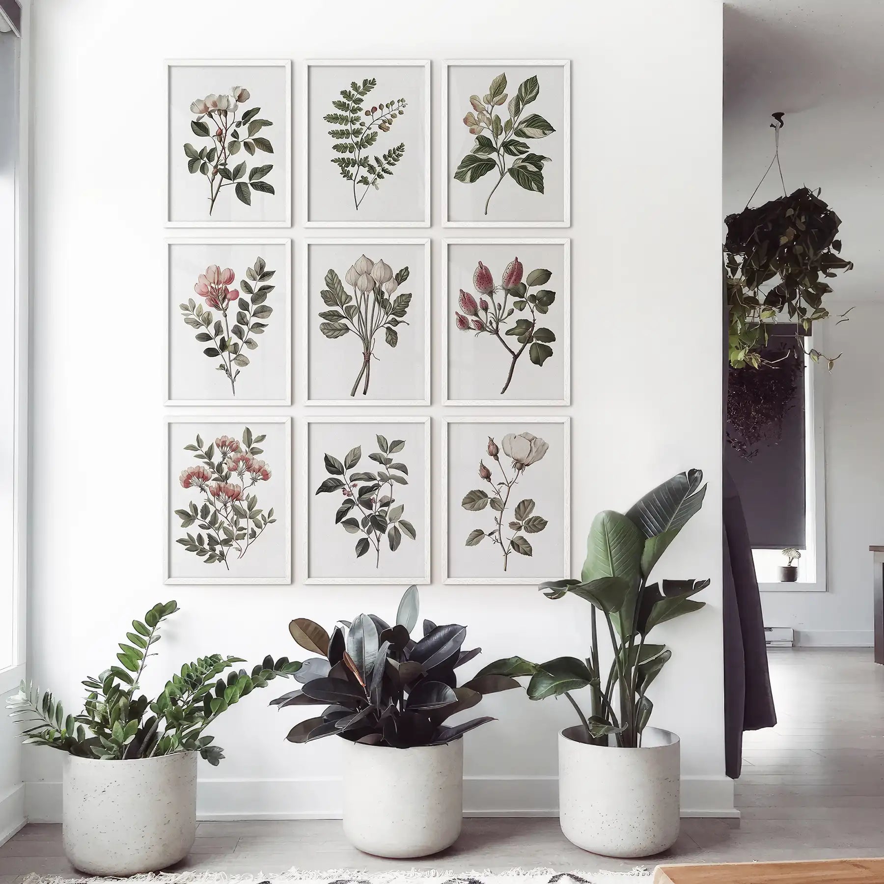 Floral watercolor print set of 9 piece. Botanical gallery vintage flowers prints. White frames in neutral interior.
