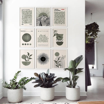 Gallery wall art set of 9 modern prints with minimalist and mid-century styles including Bauhaus and botanical elements. White frames for neutral room.