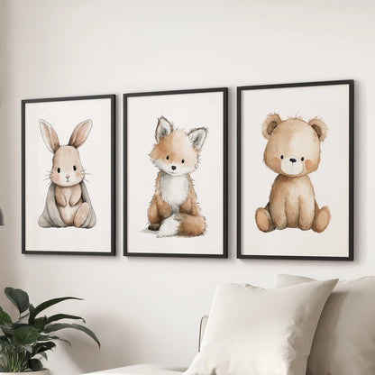 Baby animal portraits three-piece picture set brings gentle charm to a living room, hung behind the sofa in sleek black frames.