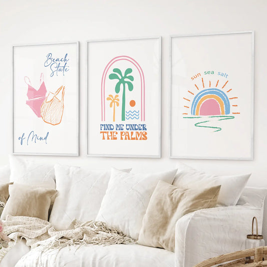 Bright beach decor prints with tropical elements and coastal summer style. White frames for living room.