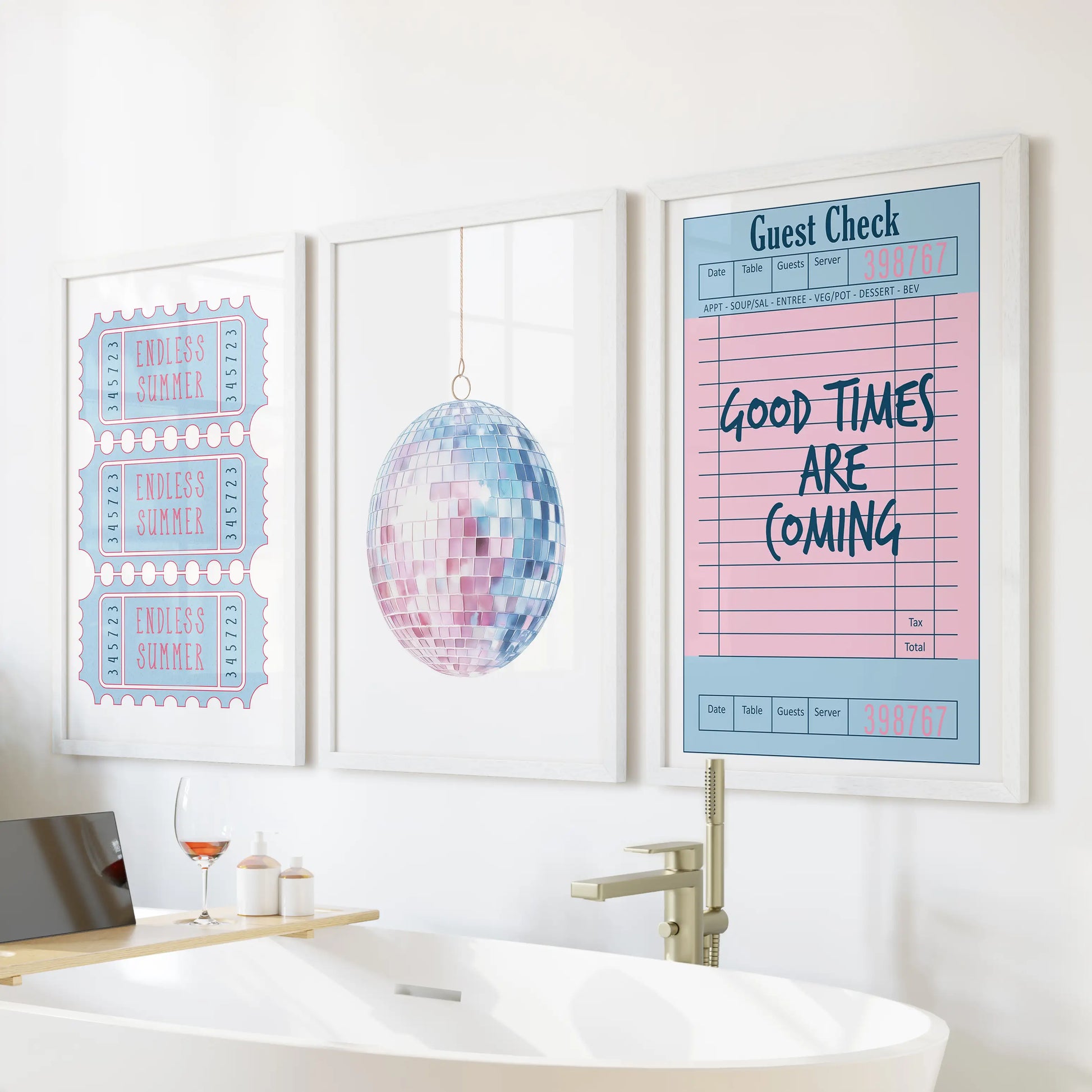 Guest check receipt 3 pc wall art set with white frames styled over the tub, paired with a disco ball and beach ticket for bright, breezy bath vibes.