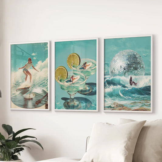 Beach cocktails three-piece wall art shakes up the lounge, sitting above the couch in white framed prints with fizzy retro color and seaside sparkle.