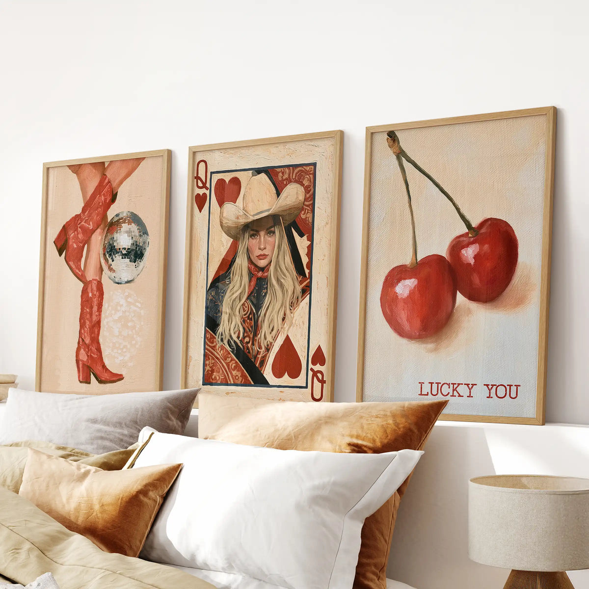 Disco cowgirl 3-piece wall decor set, thin wood-framed, rides above the bed to bring shimmer and sass to the bedroom without overpowering it.