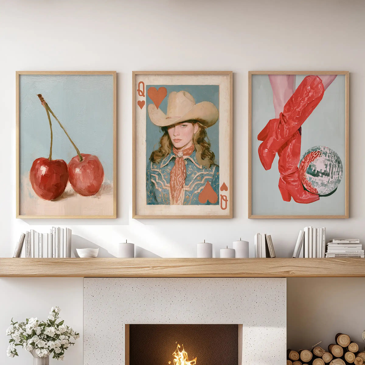 Three cherry wall prints in light wood frames stretch over the sectional sofa, sweetening the lounge with crisp retro pops of red.