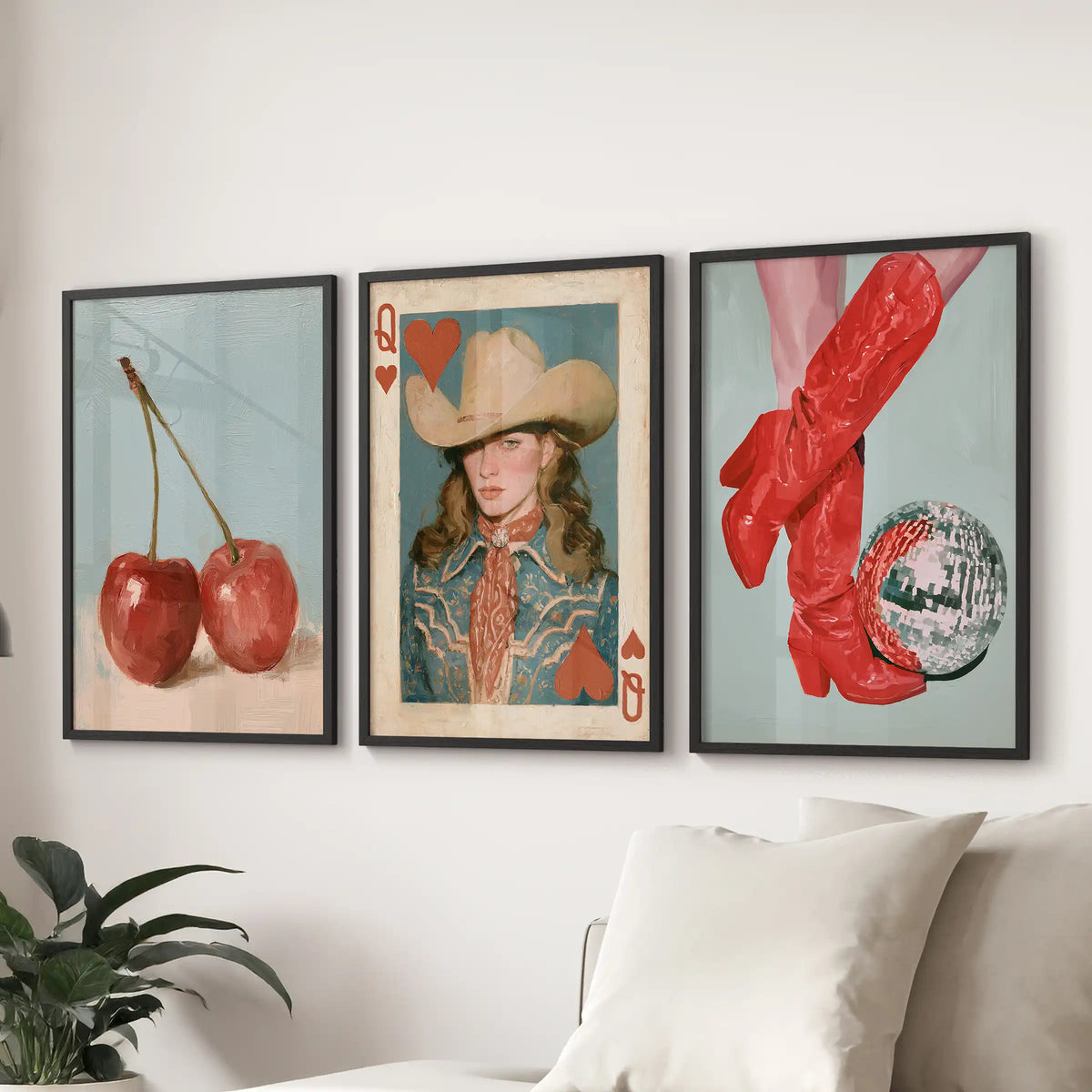 Three disco cowgirl prints with a disco ball, framed in black, hang behind the couch and add playful western shimmer to the living room.