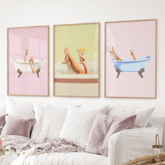 Pastel spa wall decor featuring bathtubs and martini glasses. Thinwood frames over the couch.