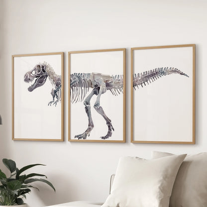 Three prehistoric animal prints in oak wood frames form a 3-wall-art set hanging over the sectional sofa, styling the family room with warmth.