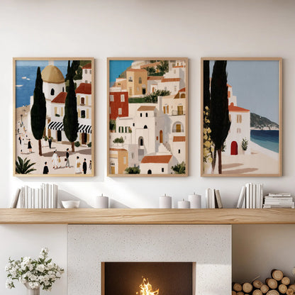 Three oak-framed retro Spain travel prints form a wall bundle above the fireplace mantel, grounding the living room with sunlit nostalgia.
