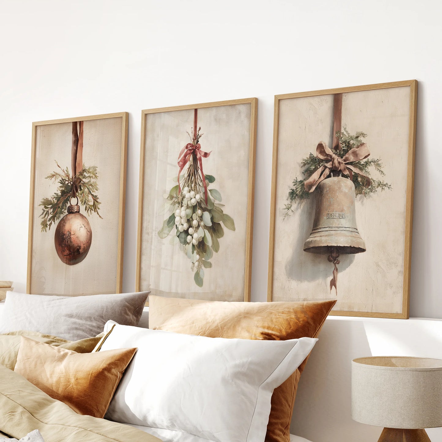 A farmhouse-style three art set in natural wood framed prints anchors the bedroom above the bed with rustic Xmas holiday character.