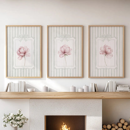 Pink peony wall art trio in oak frames, displayed above the mantel in a lounge.