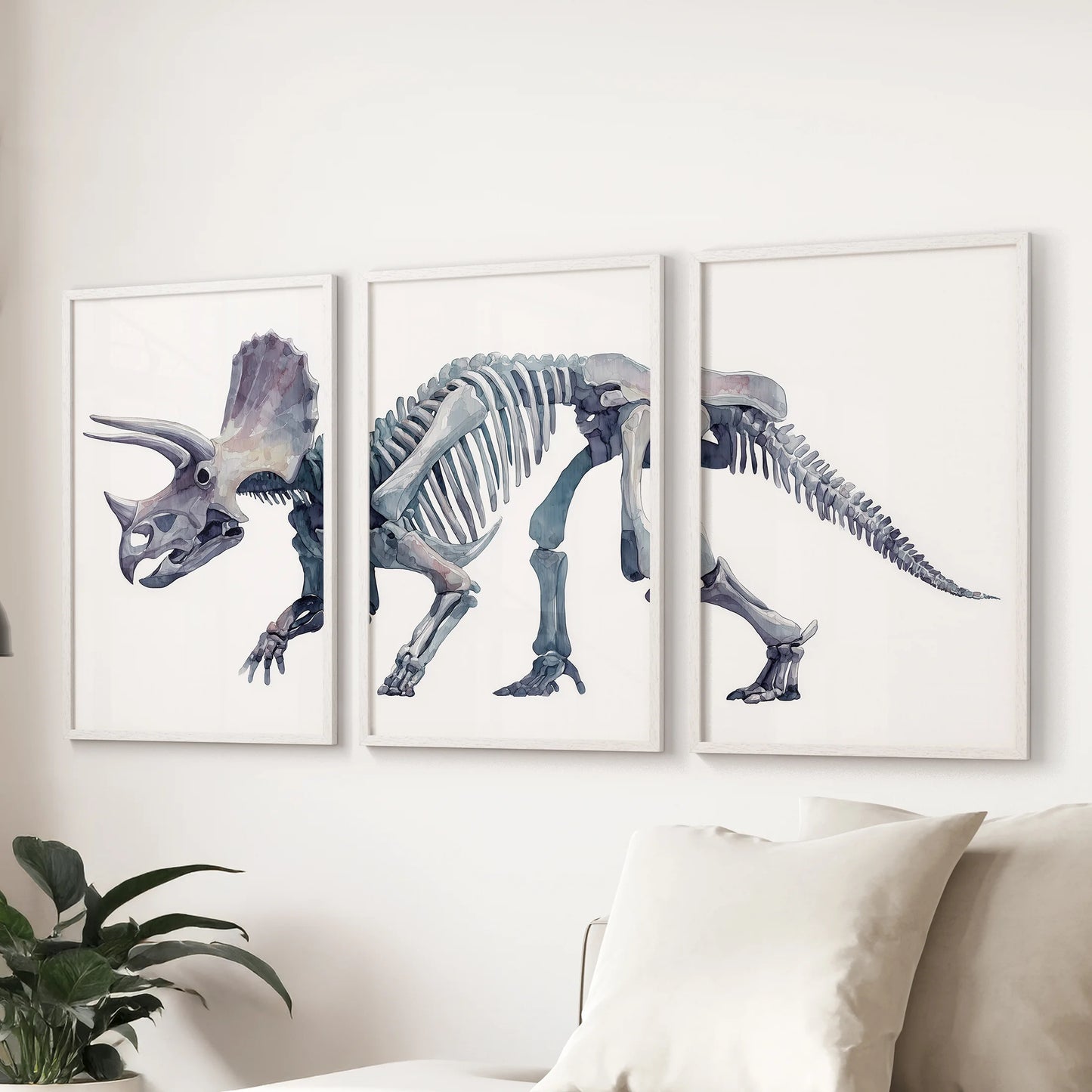 Prehistoric triceratops fossil watercolor art triptych creating elegant wall decor in a minimal Scandinavian interior.