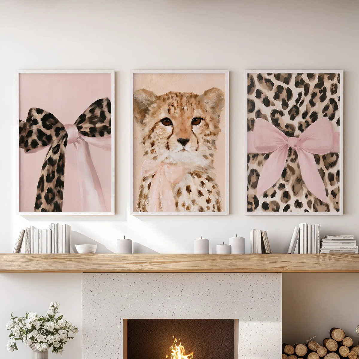 Three white-framed art prints with preppy coquette animals sit over the mantelpiece, bringing a light, polished lift to the living room.