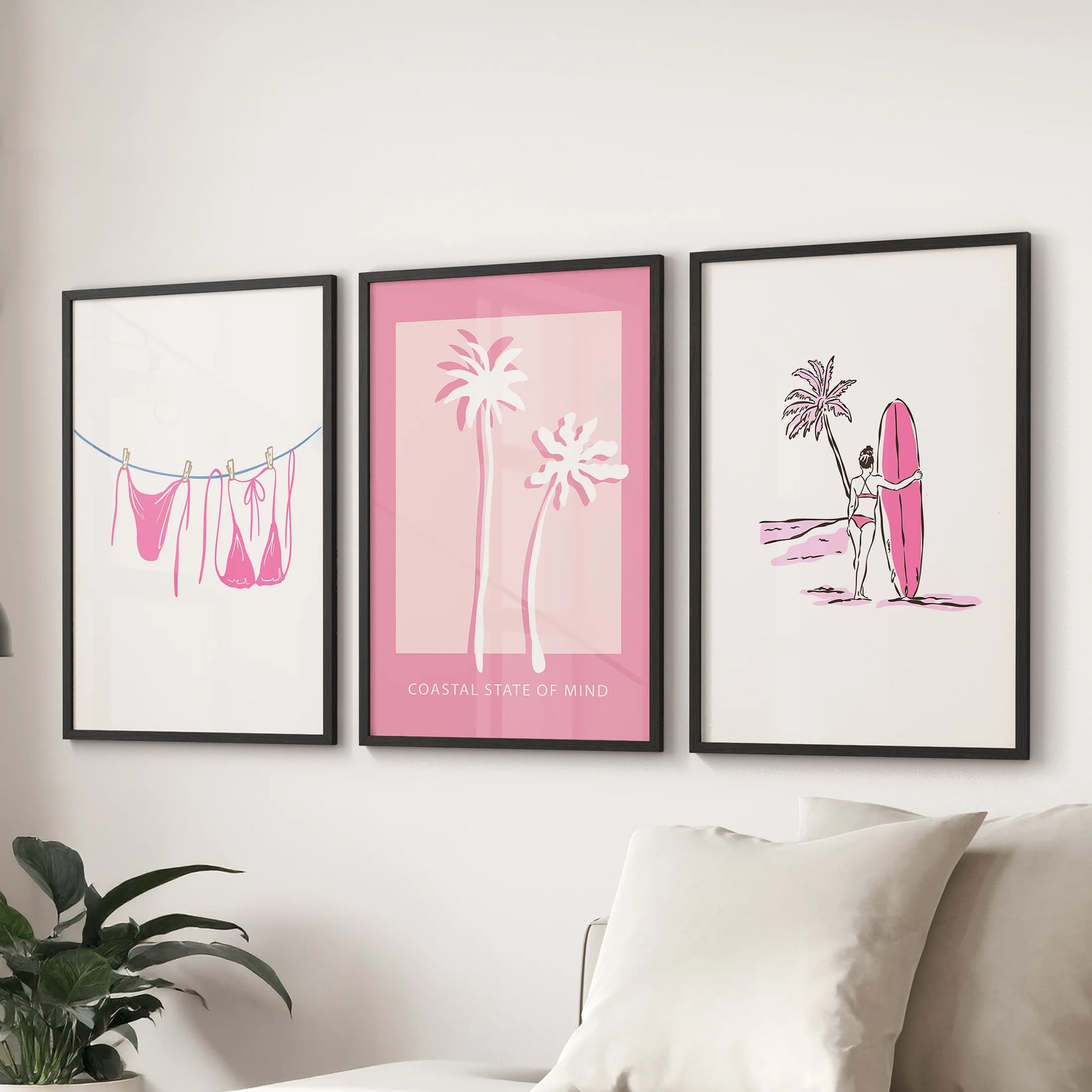 Preppy summer swimwear gallery wall set of 3 adds a playful focal point in the living room above the sofa, shown in sleek black framed prints.