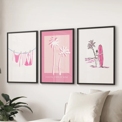 Preppy summer swimwear gallery wall set of 3 adds a playful focal point in the living room above the sofa, shown in sleek black framed prints.