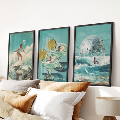 A set of 3 posters featuring surfer girl art brightens the bedroom, displayed over the bed in sleek black frames with retro summer blues.