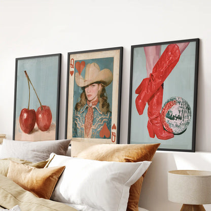 Red cowboy boots 3-piece wall art in slim black frames anchors the space above the bed's headboard, giving the bedroom a flirty western kick.