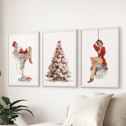 Vintage Christmas tree prints, a 3-piece print set in white frames, brighten the family room when arranged above the sectional sofa.