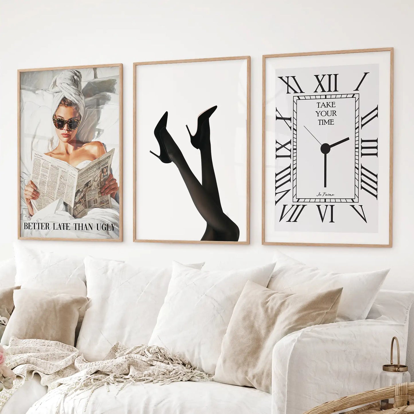 Contemporary fashion wall art collection with woman reading, high heels, and minimal clock design. Thinwood frames above the sofa.