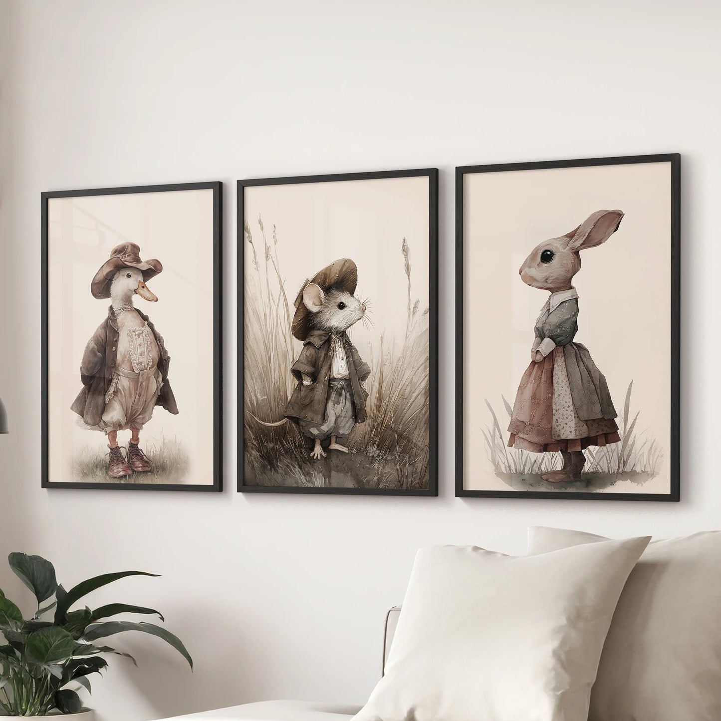 Cute mouse poster, set of three wall art in black frames, styled above the family-room sofa with coordinating vintage goose and rabbit.