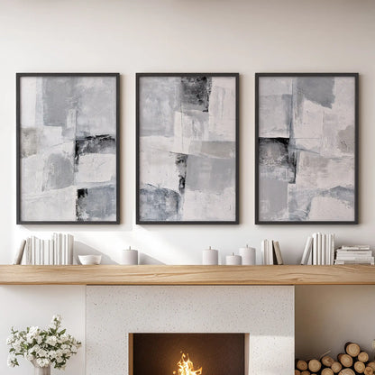 Monochrome minimalist abstracts wall decor set of three arrives in black framed prints, styled over the mantle to ground the sitting room in cool balance.