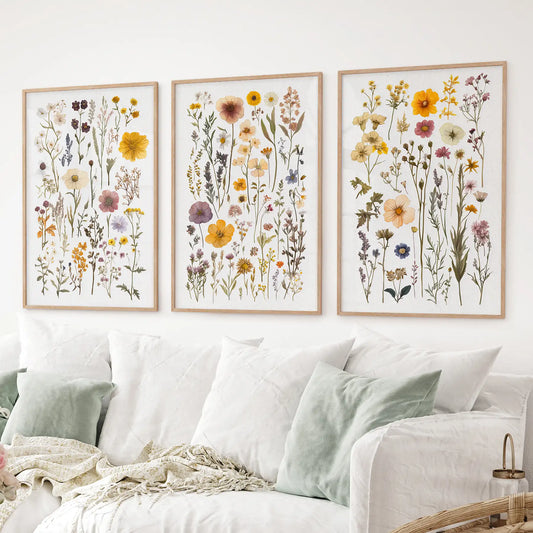 Vibrant wildflower wall posters in earthy natural tones. Modern floral set. Thinwood frames for living room.