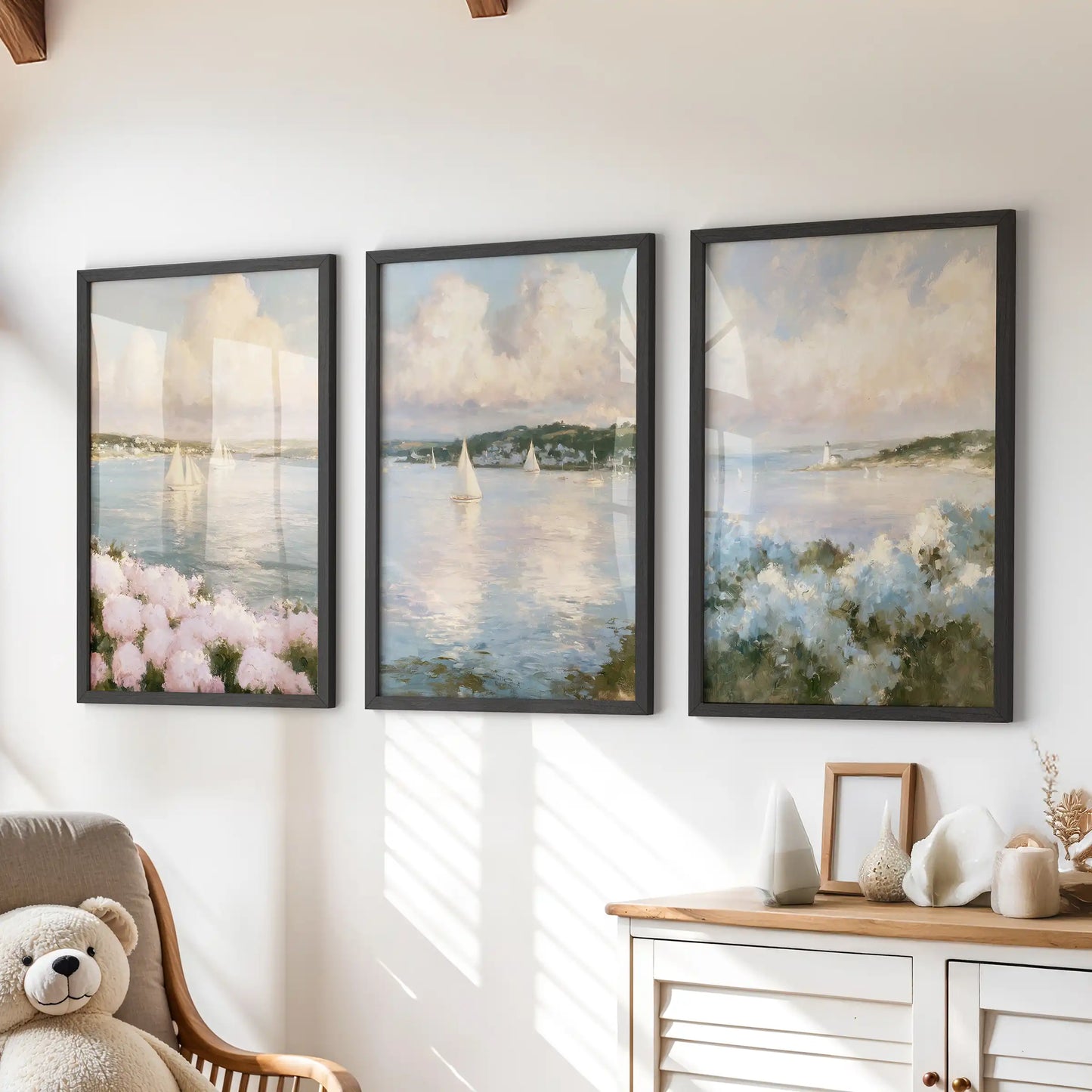 A 3-piece wall art print set of hydrangea beach flowers brightens the playroom above the dresser. Black frames pair with breezy sea-and-sand hues.