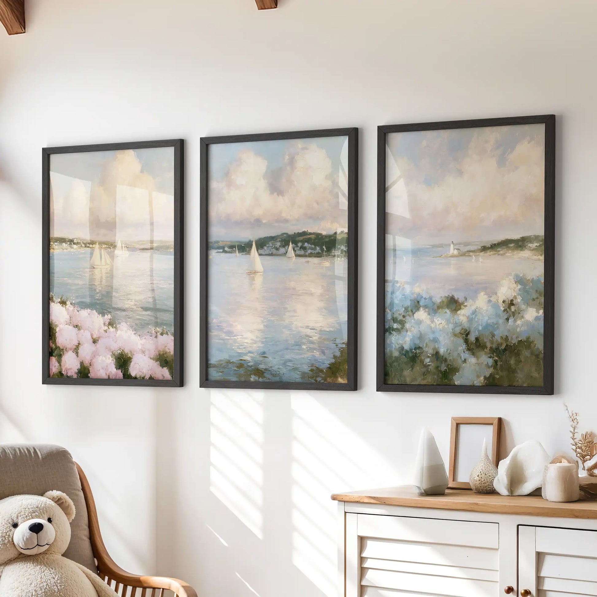 A 3-piece wall art print set of hydrangea beach flowers brightens the playroom above the dresser. Black frames pair with breezy sea-and-sand hues.