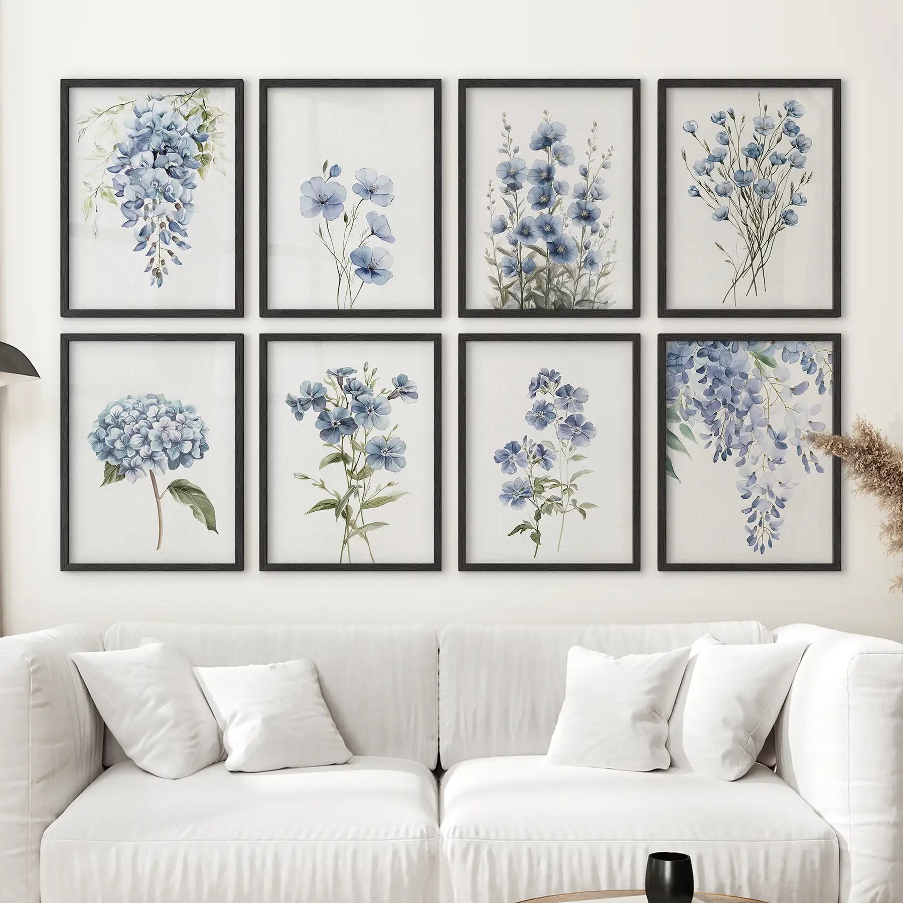 Blue botanical art print set of 8 , showcasing soft watercolor flowers like hydrangeas, wisteria, and pansies. Black frames for living room.