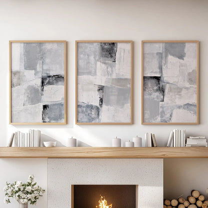 Organic modern shapes set of 3 wall art prints, edged in thin wood frames, layers quiet rhythm above the mantel in the sitting room.