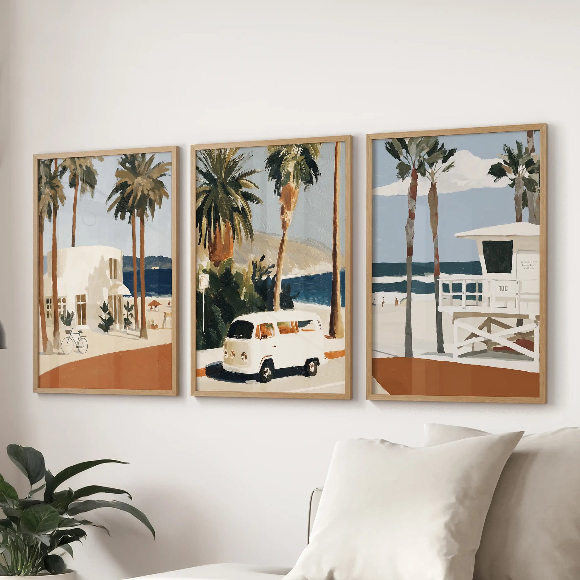 Oak-framed Laguna Beach shoreline photos-set of three-span the sitting room wall above the sectional with fresh coastal light.