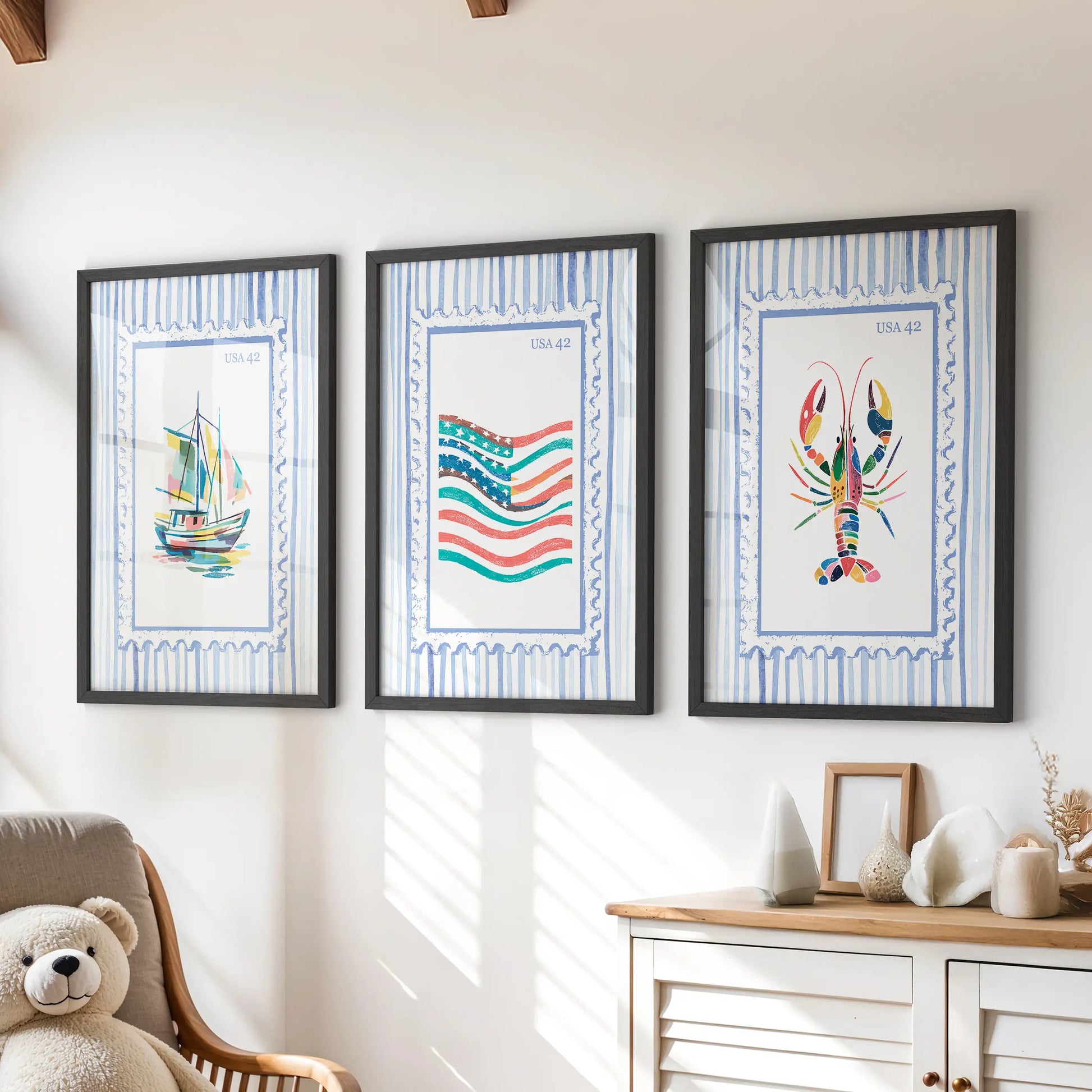 Beach stamp illustrations, a three-piece wall art set in crisp black frames, arranged over the dresser to brighten a children’s room.