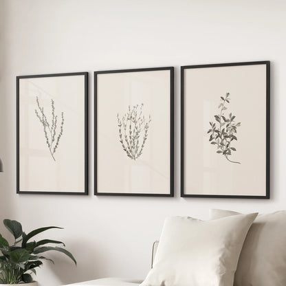 Rustic dried floral stems 3-print wall art bundle in black frames spans the sitting room over the sectional, adding earthy, pared-down character.