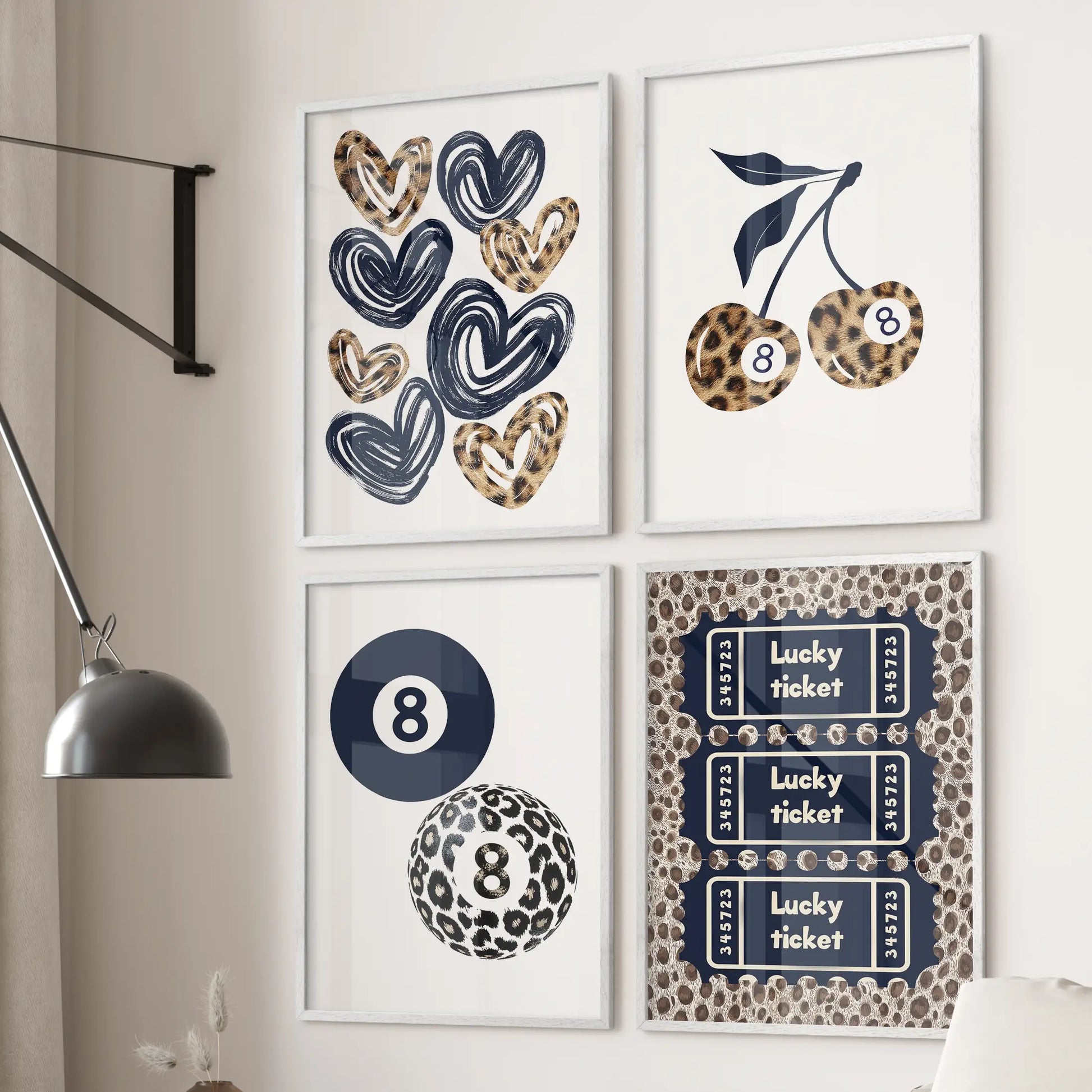 Lucky ticket four-print wall art set, shown as white framed prints above the living room sofa, adds retro charm alongside hearts, cherries, and an 8 ball on blue cheetah.