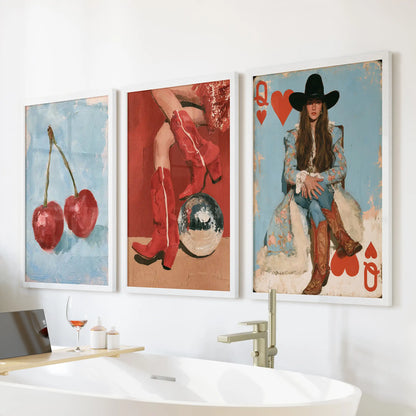 Western glam wall art comes as a trio of white-framed prints above the bath, giving the bathroom a chic rodeo twist.