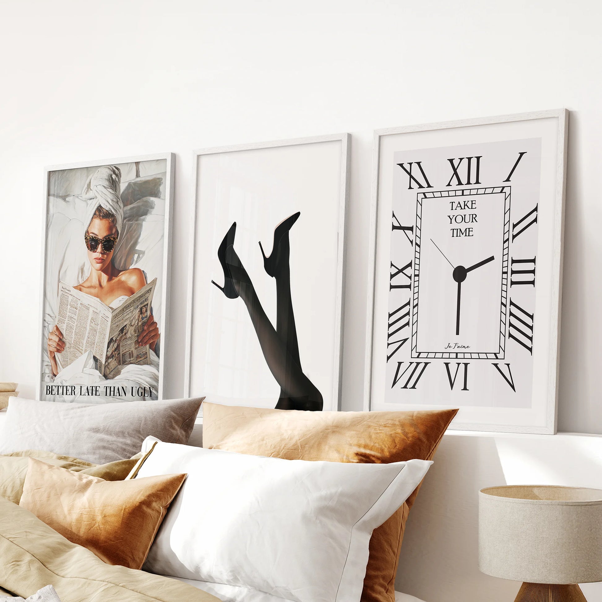 Y2K girl aesthetic posters, a print trio in crisp white frames, mount above the bed to deliver playful coquette wall art for a chic bedroom.