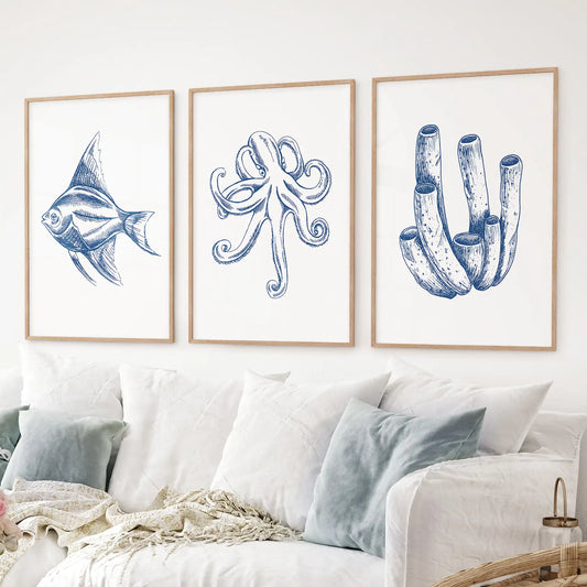 Minimalist marine life drawing art decor. Fish, Octopus, coral trendy wall prints. Thinwood frames over the couch.