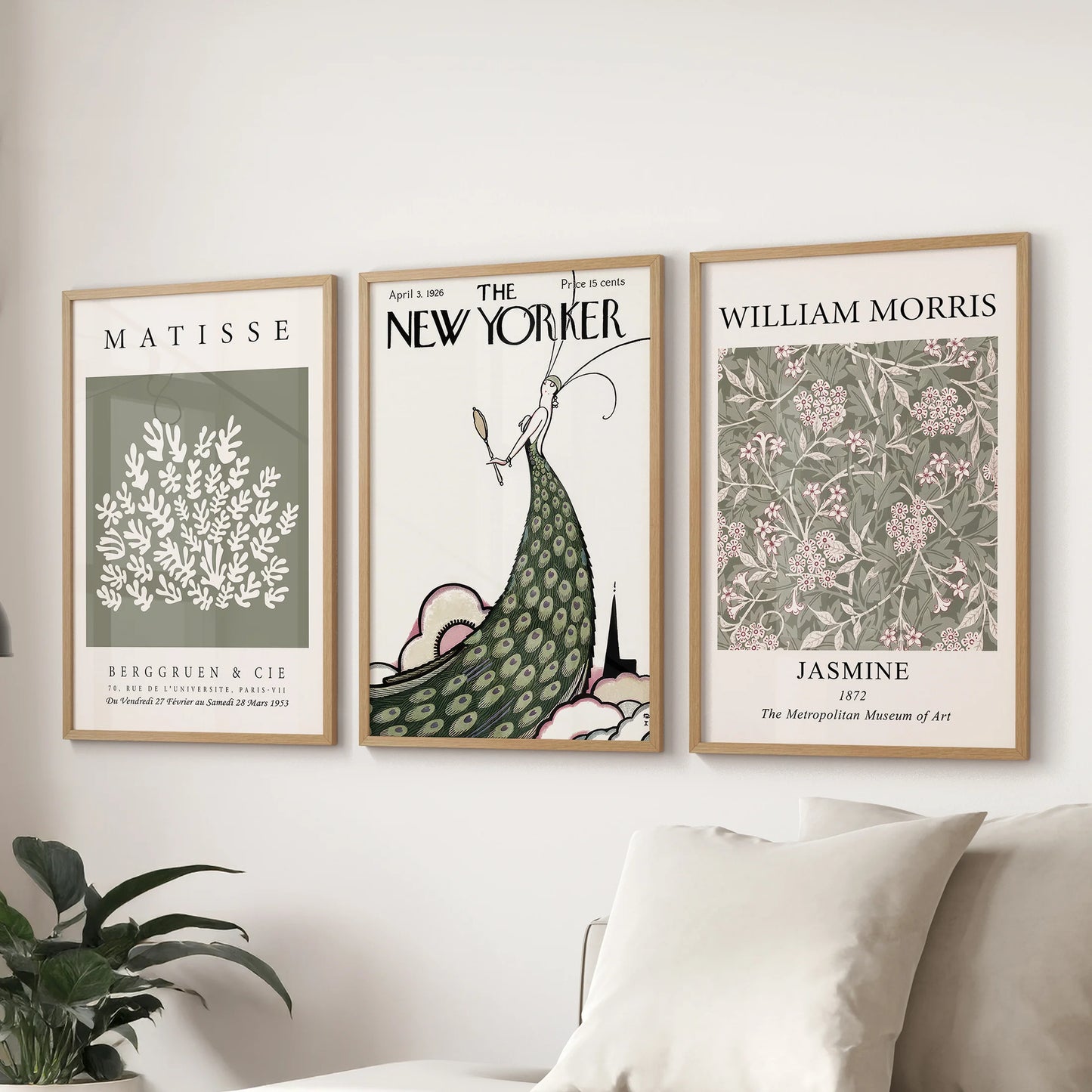 A gallery wall of 3 prints with Matisse-inspired forms and natural oak frames complements the lounge space over the sofa.