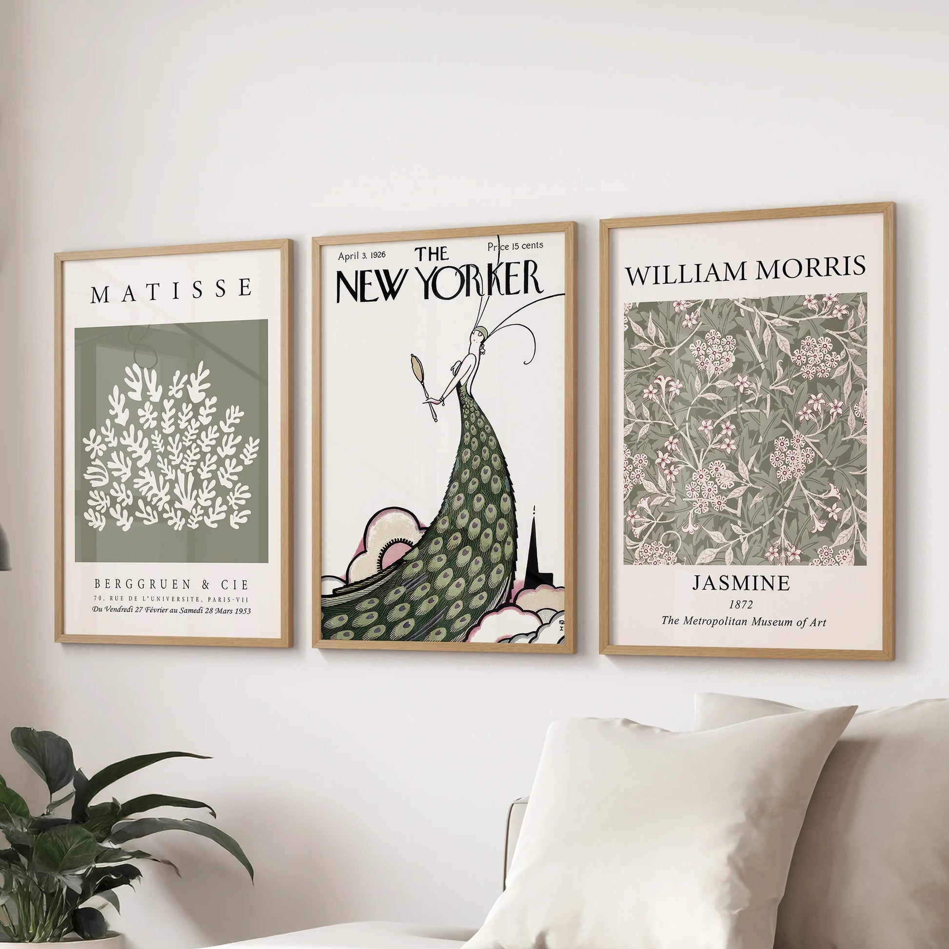 A gallery wall of 3 prints with Matisse-inspired forms and natural oak frames complements the lounge space over the sofa.